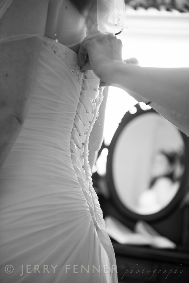 Lacing up the wedding gown