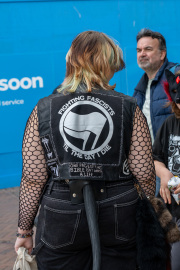 A demonstrator stands at the Unity Demo held in The Square, Bournemouth, Dorset, on October 3rd, 2026, showcasing a vest featuring an anti-fascist emblem and a strong political statement reflecting their role in the ongoing protest.#jerryfennerphotography#newforestphotographer#Bournemouth#UnityDemo#Dorset#AntiFascist