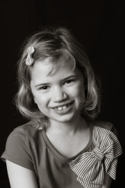 Black and white photograph of a young girl