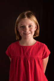Pretty girl in red photographic portrait