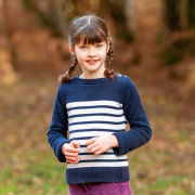 Lovely young girl photographed in the autumnal forest