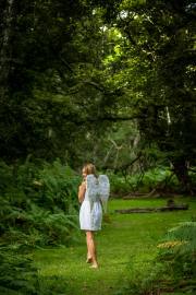 The Wildwood's heart, a feathered soul softly listening.