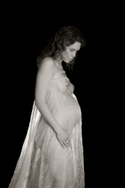 Pregnancy bump under a floaty fabric