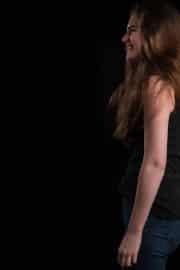 A joyful teenager captured in a spontaneous, candid moment during a session for our Teenage photographs series held at The Studio on the Hill. The low-key studio lighting emphasizes her genuine expression, highlighting the relaxed and professional atmosphere provided for young people looking to build their portfolios.#jerryfennerphotography #newforestphotographer #teenportrait #studiophotography #candidportrait #portraitphotography