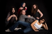 This striking example of professional portraiture captures a group of five teenagers posing for a studio session at The Studio on the Hill in Bransgore, Hampshire. These teenage photographs were taken to document the unique personal styles and collective energy of the group, utilizing controlled lighting to create a moody and expressive atmosphere for their shared session.#jerryfennerphotography#newforestphotographer#portraiture#teenagephotographs#studioshoot#groupportrait
